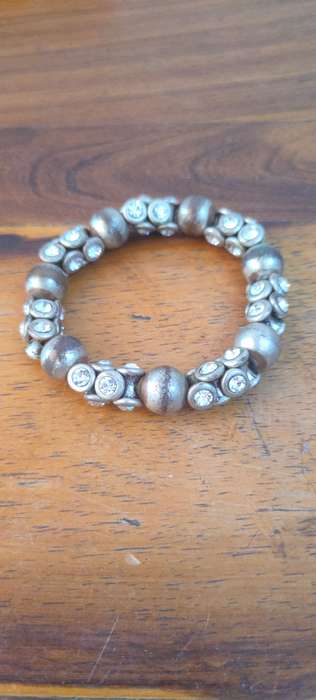 Stretch bracelet with silver colored beads