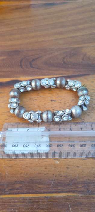 Stretch bracelet with silver colored beads
