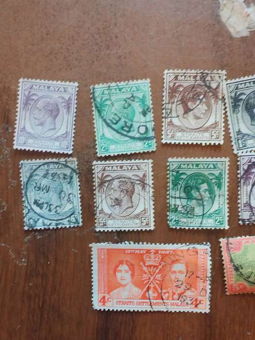 Large lot of vintage Malaya straits settlements stamps