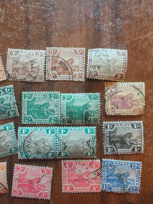 Large lot of vintage Malaya straits settlements stamps
