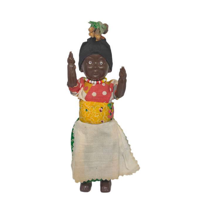 Vintage South African souvenir doll with sleep eyes