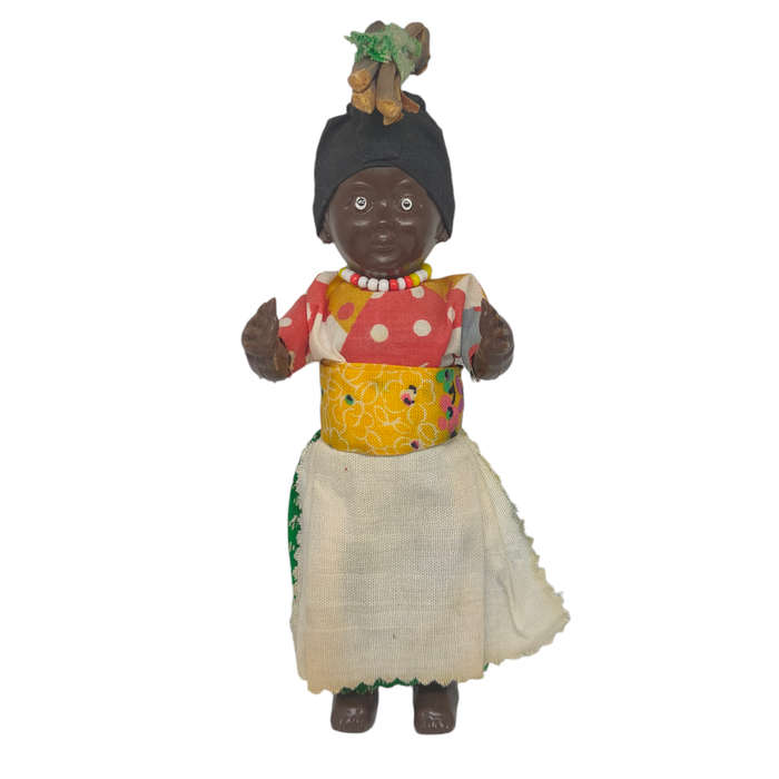 Vintage South African souvenir doll with sleep eyes