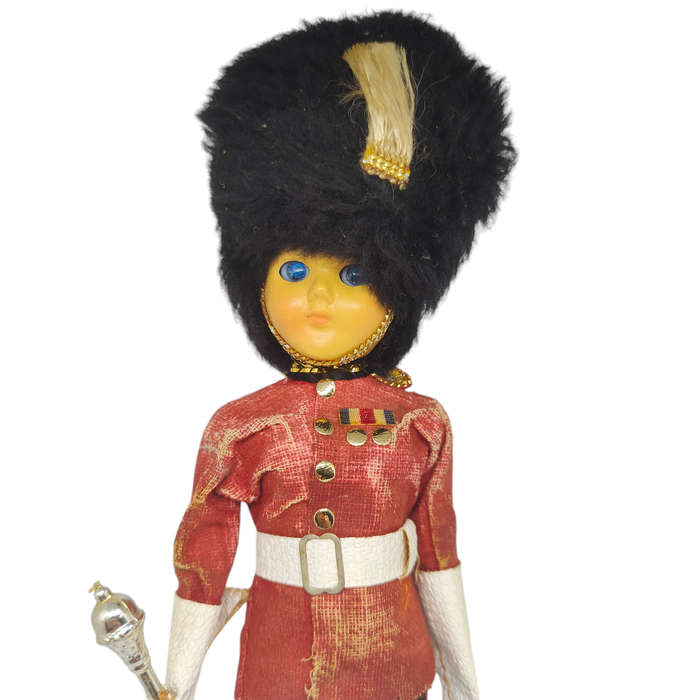 Vintage British royal guard souvenir doll with sleep eyes