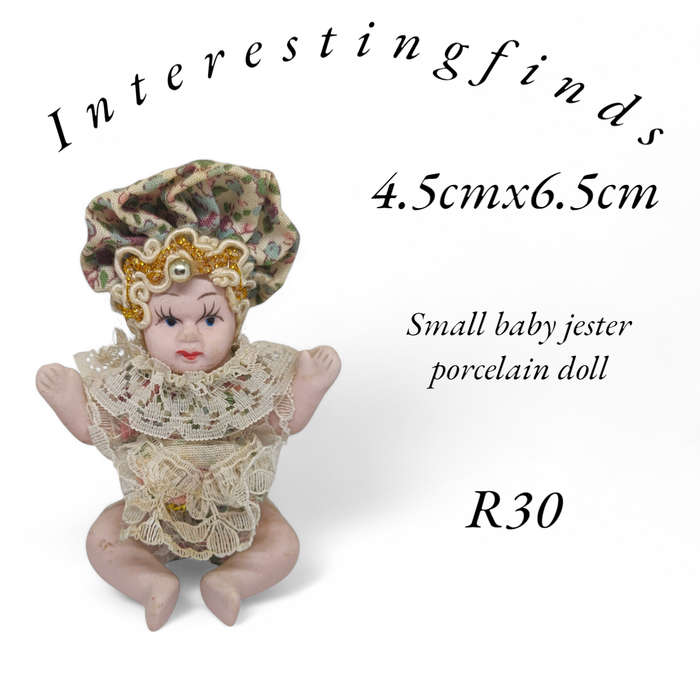 Vintage small baby/jester porcelain doll