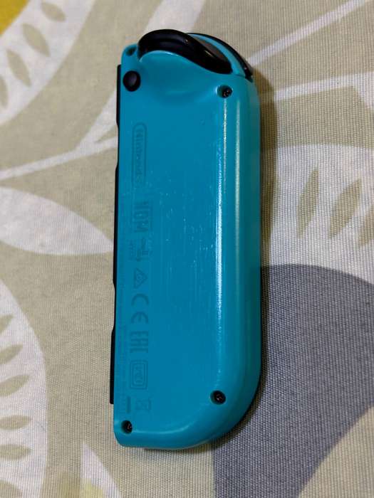 neon blue Left Joy-Con controller for Nintendo Switch + wrist strap