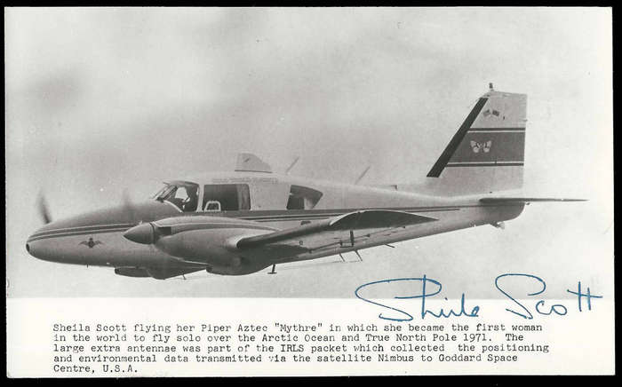 Aviation.  Postcard sized photo signed by pilot Sheila Scott.