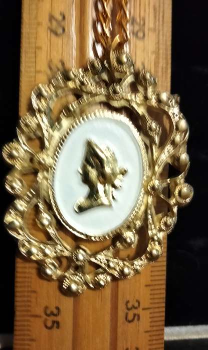Necklace - Cameo Pendant gold tone on white metal embossed gold tone Lobster clasp metal chain