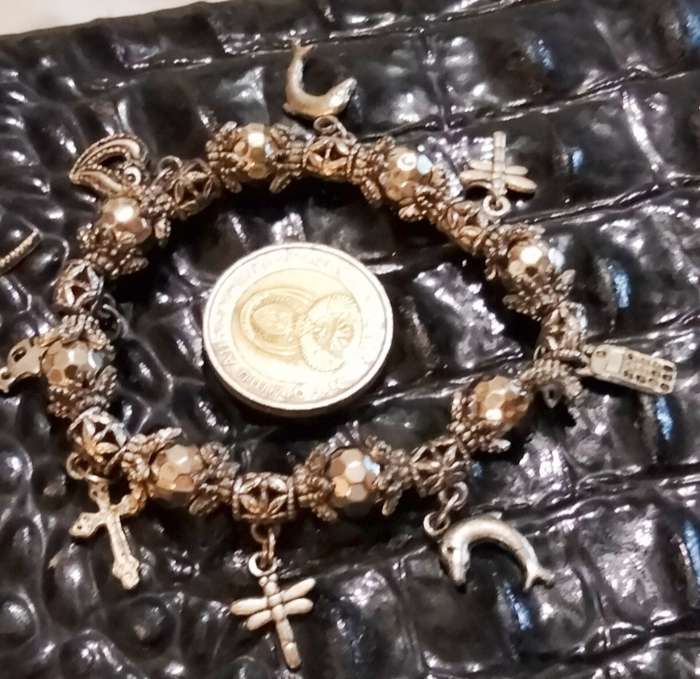 Similar Bracelets 2 Stretch charms Silver Tone costume jewellery look at my Buy Now items No Waiting
