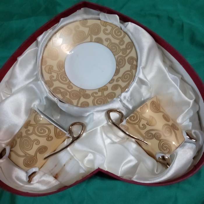 VINTAGE CUP AND SAUCER