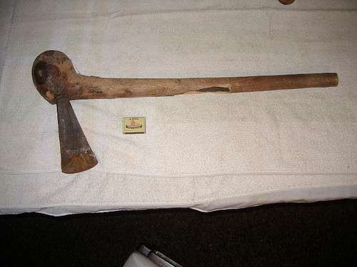 Antique old wooden steel axe from Africa