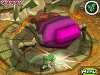 Link taking on a boss in The Legend of Zelda: Spirit Tracks
