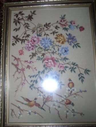 Tapestry in wool of flowers + birds