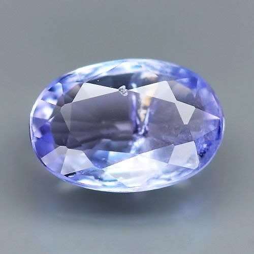 0.49ct - FLASHING Oval Violet Blue TANZANITE