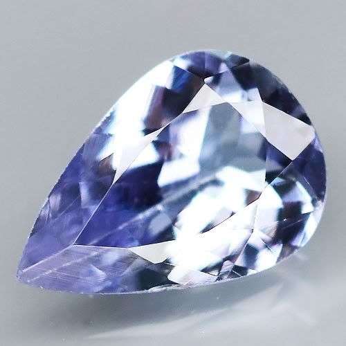 0.64ct - FLASHING Pear Violet Blue NATURAL TANZANITE