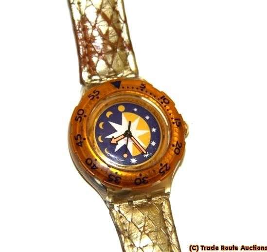 SDK112 Swatch - Scuba Golden Island Hands Glow - Clearance SALE grab a BARGAIN