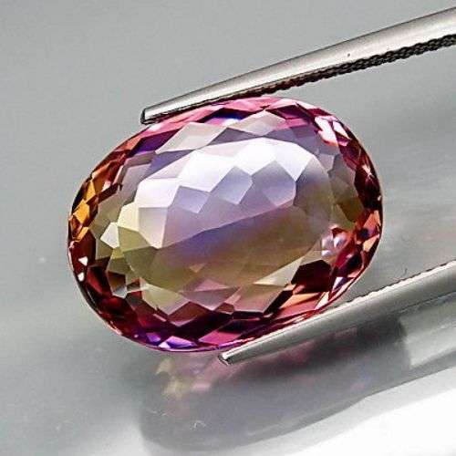 ONE OF OUR BEST!  AMAZING 13.56CT. OVAL FACET 100% NATURAL HUGE PURPLE AND GOLDEN BOLIVIAN AMETRINE