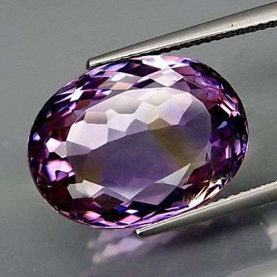 TOP QUALITY GEMSTONE!  GORGEOUS 13.86CT. OVAL FACET 100% NATURAL PURPLE & GOLDEN BOLIVIAN AMETRINE