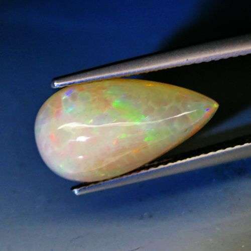WHAT A MAGNIFICENT OPAL THIS IS!  4.50CT.PEAR CABOCHON NATURAL GOLDEN RAINBOW COLOUR OPAL 100%