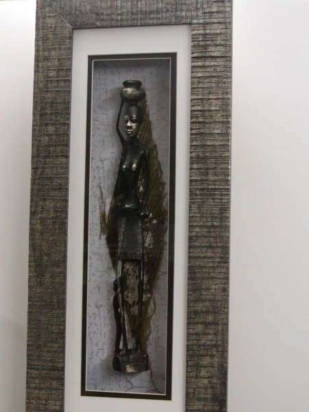 African Figure with silver highlights on palmbark