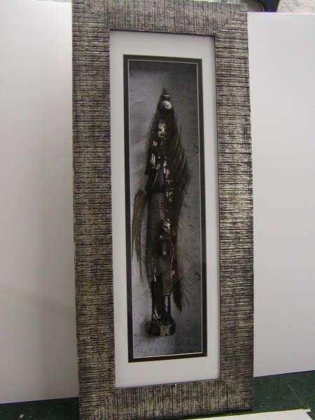 African Figure with silver highlights on palmbark