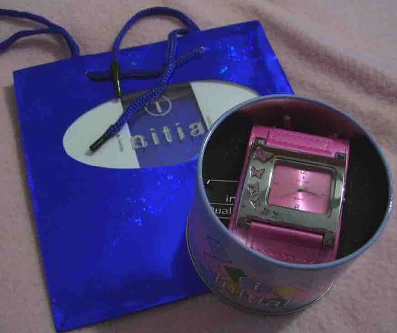 Authentic Initial Lady's watch with gift bag... in Pink