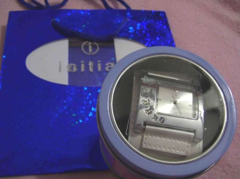 Authentic Initial Lady's watch with gift bag... in White