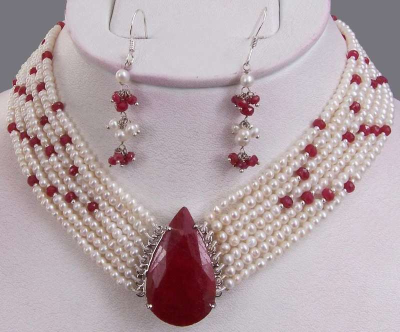 Designer 7 strand Pearl and Ruby necklace with 925 silver Ruby clasp cum pendant