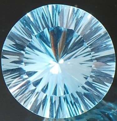 8.31cts Round Concave Cut Swiss Blue Topaz - Flawless