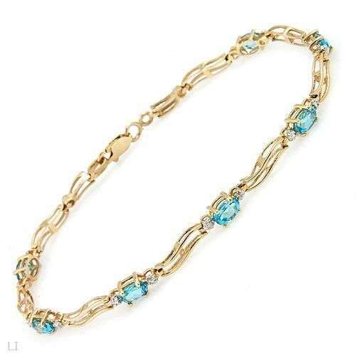 2.11ctw Diamond and Topaz 4.20g 10K Yellow Gold Bracelet