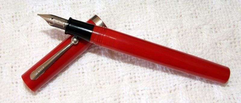 A nice old red Sheaffer No-Nonsense pen with 3 nibs in original box