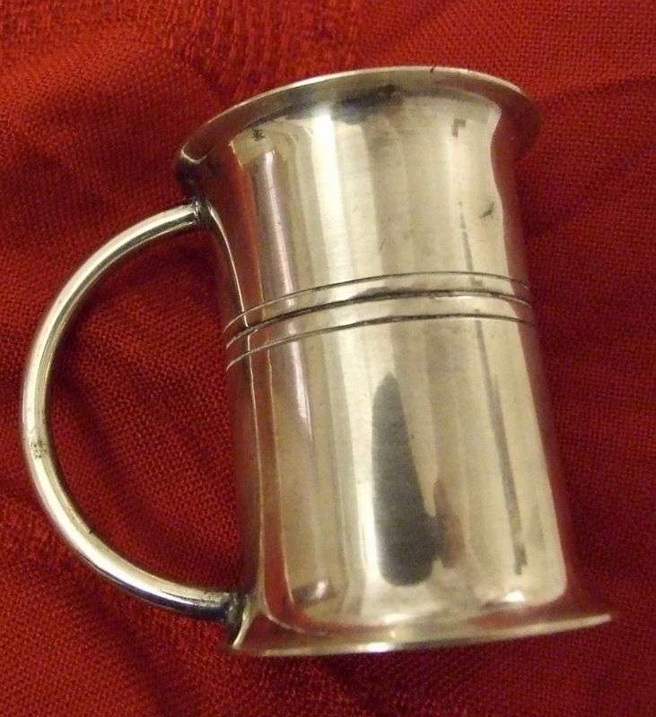 A nice old silver plated 1oz. & 2 oz. double tot /single tot measure in good condition.