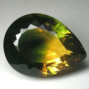 31.30cts.RAVISHING YELLOW GREEN AMETRINE PEAR GEM.