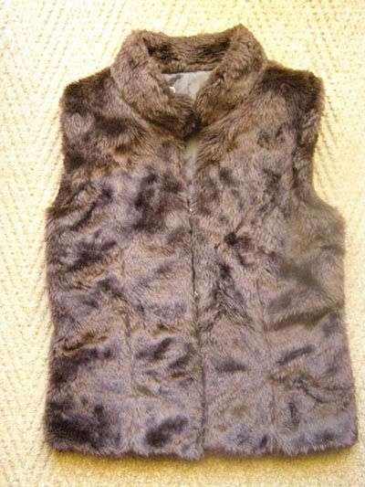 YDE Milla fur jacket to wear over a longsleeve top