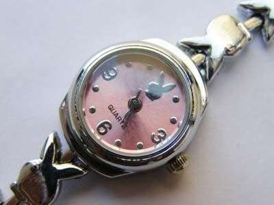 Stunning Pink Playboy watch with silver bunny strap!
