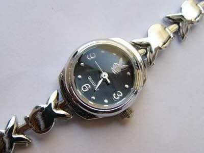 Stunning Black Playboy watch with silver bunny strap