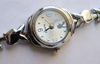 Stunning silver Playboy watch with silver bunny strap!