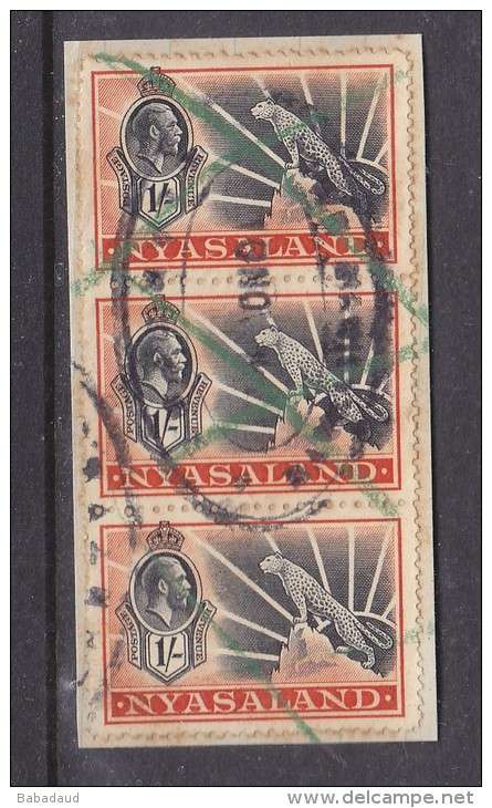 NYASALAND 1934 GEORGE v 1/= LEOPARD, vertical strip of 3, revenue cancel