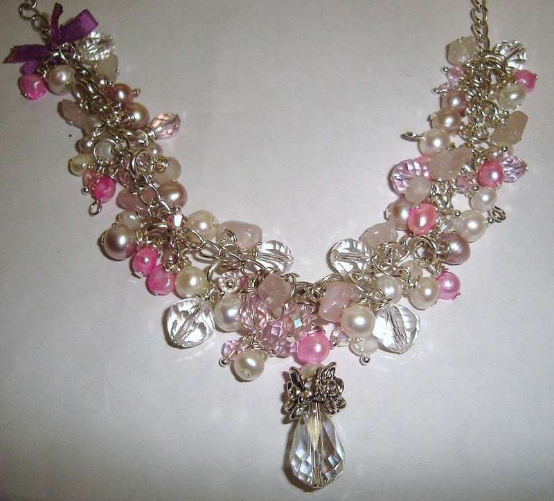A beautiful combination of authentic pink, lavender and white freshwater pearls, swarovski crystal and rose quartz