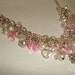 A beautiful combination of authentic pink, lavender and white freshwater pearls, swarovski crystal and rose quartz