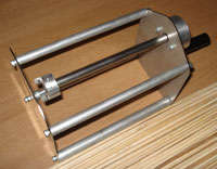 Photo: Potato Spiral sticks next to potato cutter