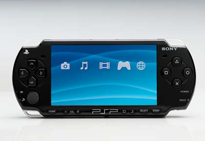 PSP SLIMLINE, PLUS FREE GAME AND CHARGING GRIP + CAR CHARGER!