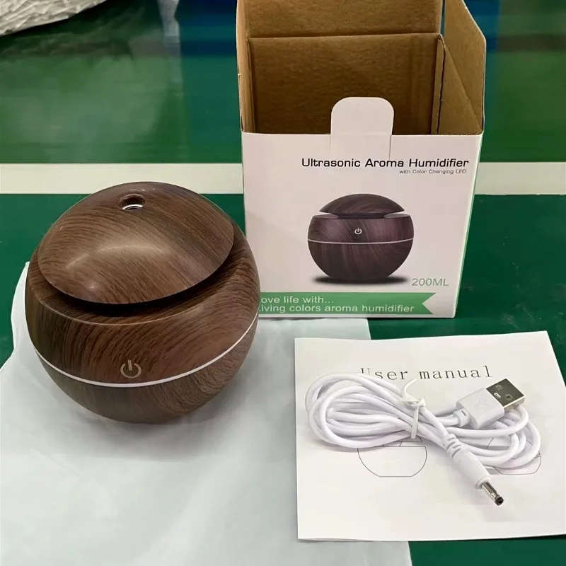 Ultrasonic aroma humidifier with color changing LED
