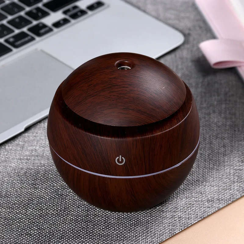 Ultrasonic aroma humidifier with color changing LED