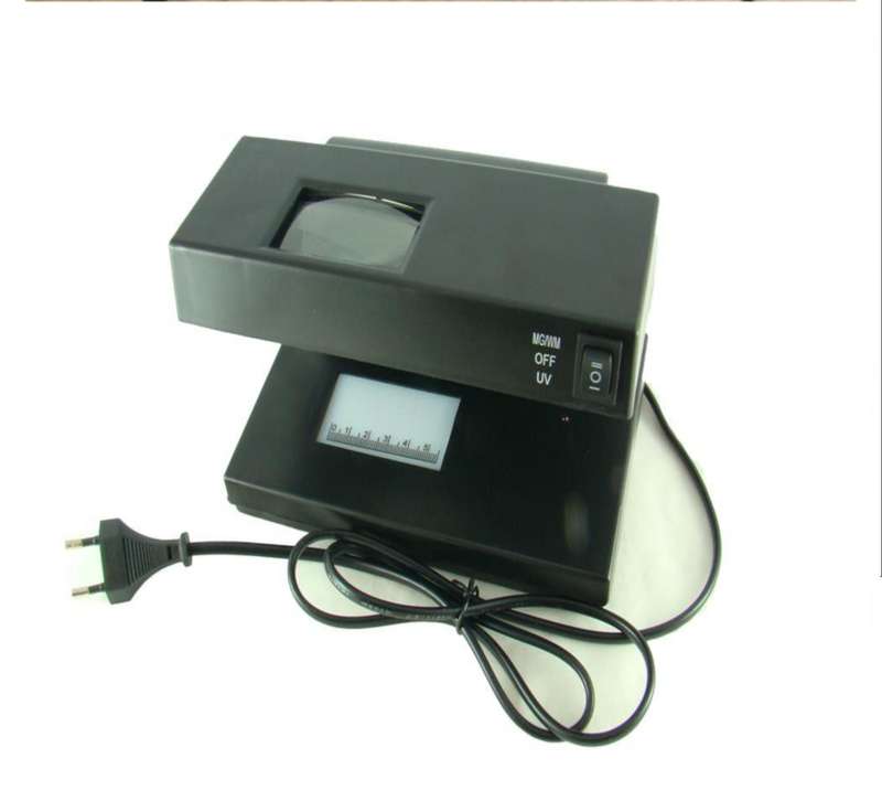 Counterfeit money detector