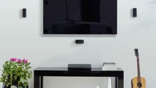 Bose cube speakers mounted with UB-20 Series II wall/ceiling brackets