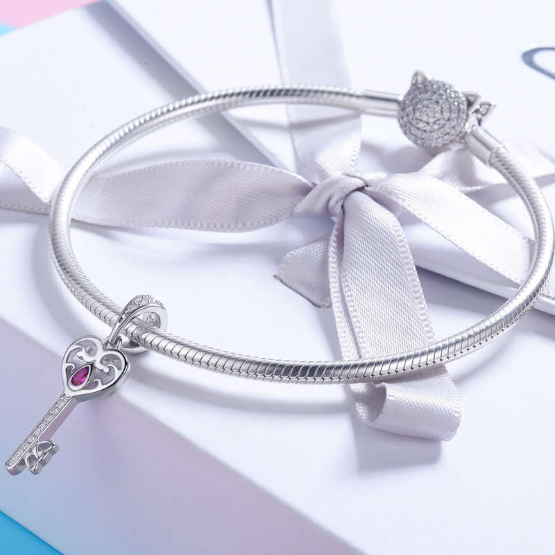 Filigree Cubic Key Charm