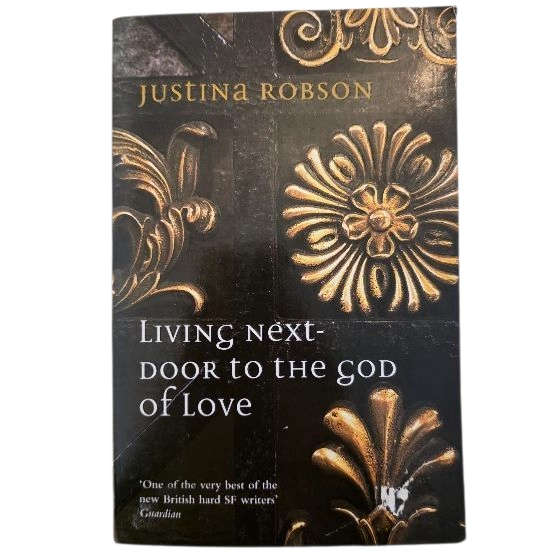 Living Next Door To The God Of Love - Justina Robson