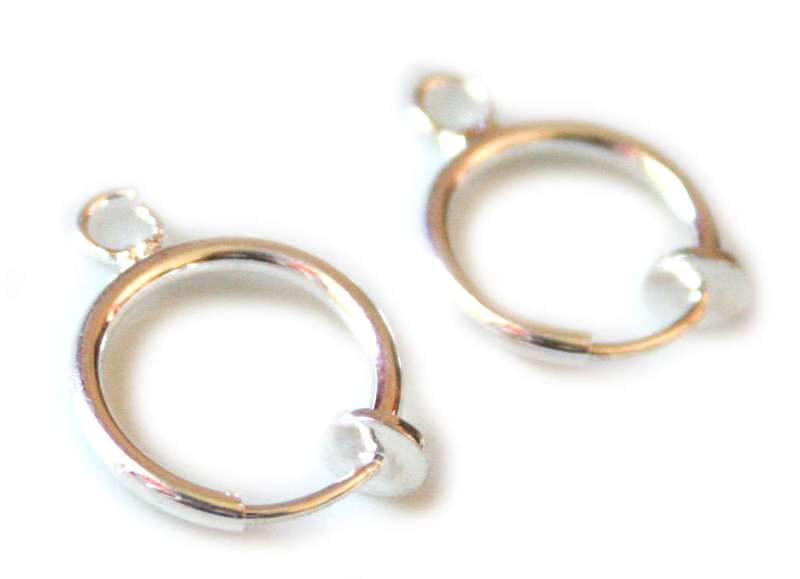 Clip on, spring earing component pair. Bright silver colour. 13mm