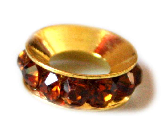 4x Topaz coloured rhine stones set in rondelle. Gold base colour. 12mm