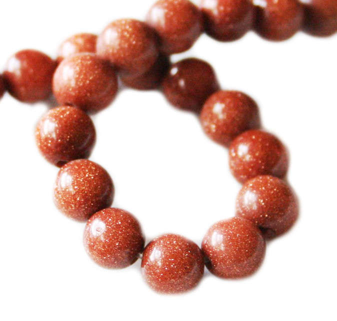 Goldstone bead string, round, 8mm, 40cm